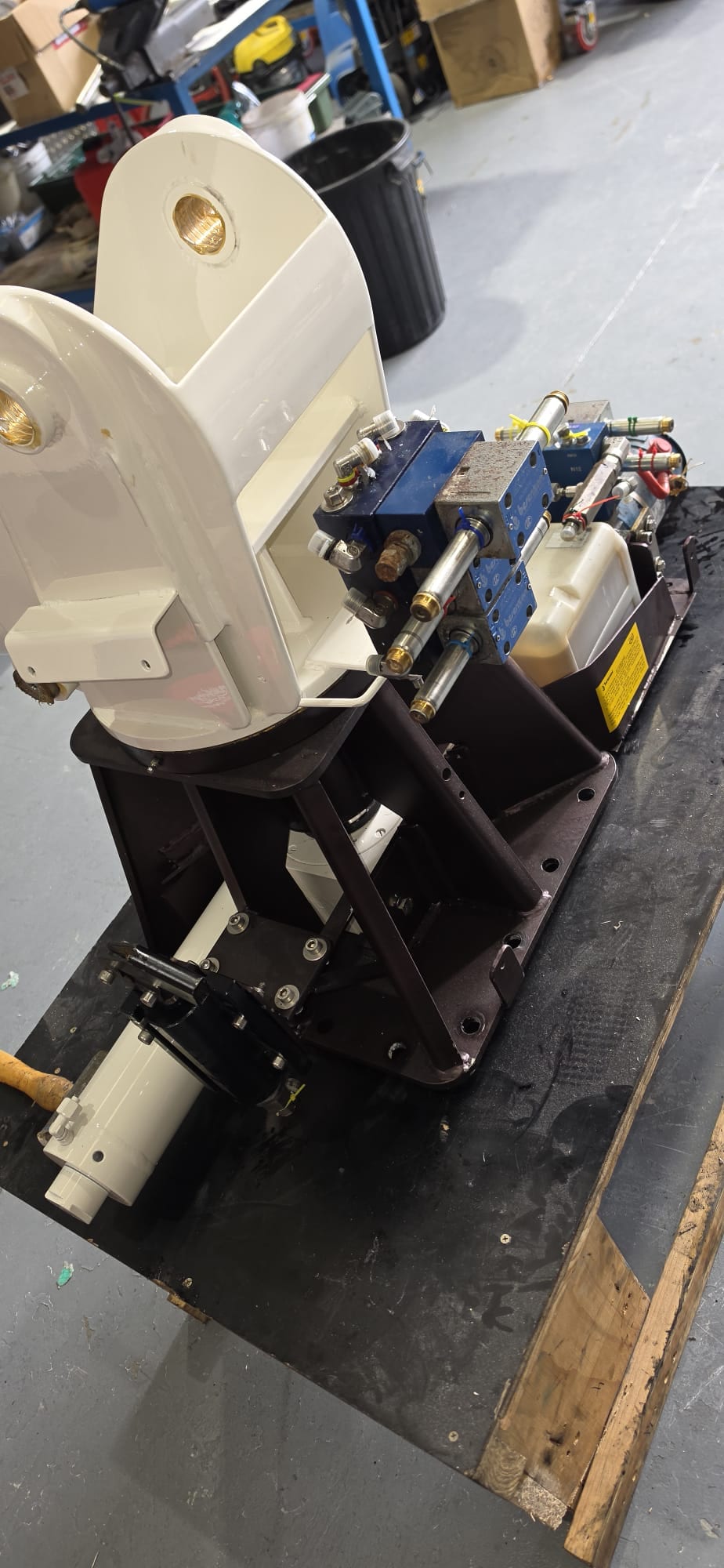 Power pack and valve stack refitted to the pedestal, boom pivot in place