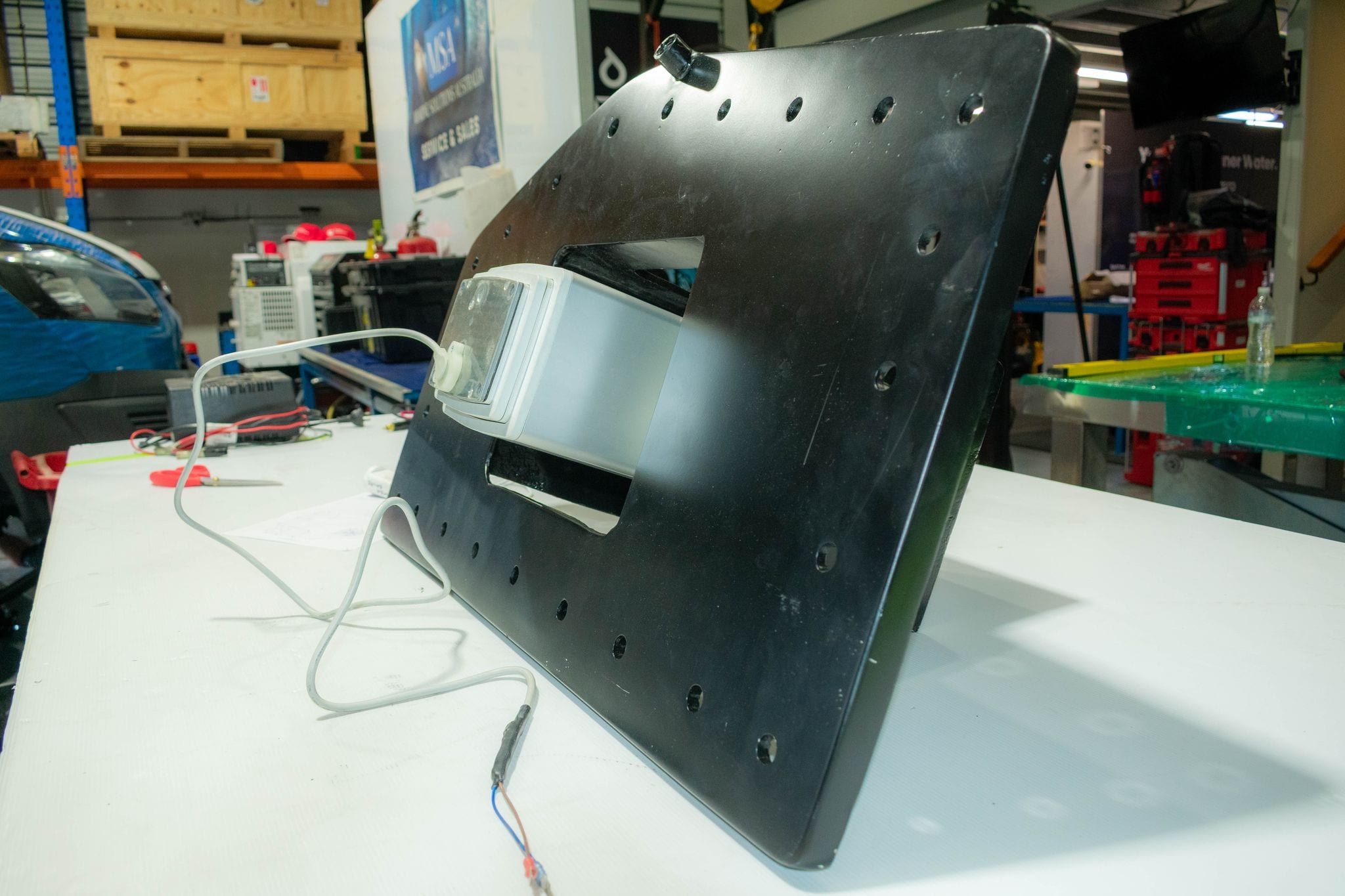 Marine Solutions Australia technician carrying out onboard electronics installation work