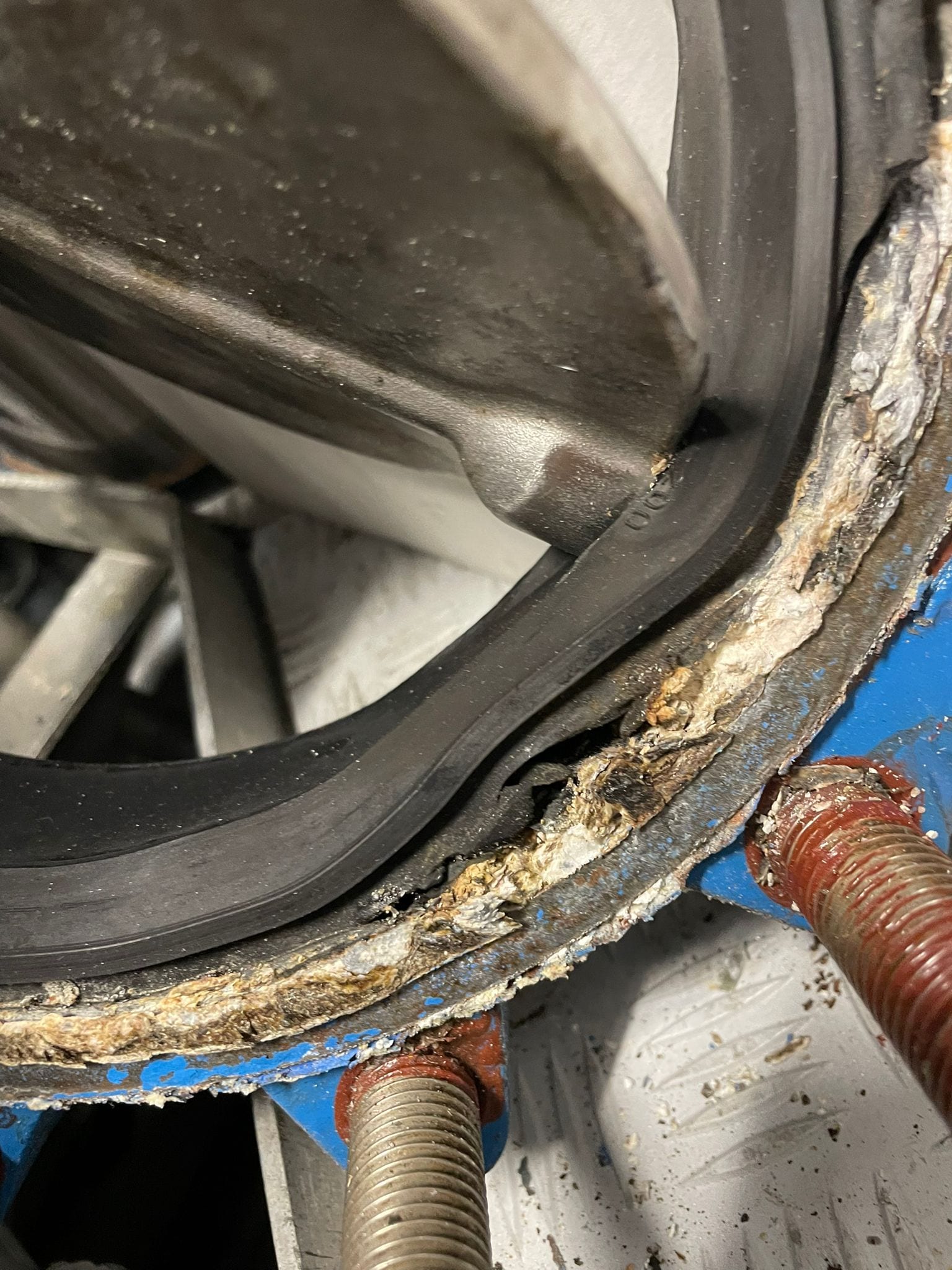 Perished seat seal and corrosion inside one of the original butterfly valves