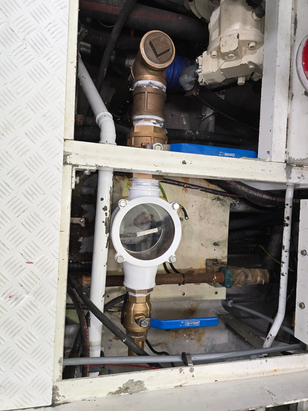 Refurbished sea strainer back in service with a clear lid and new bronze valves