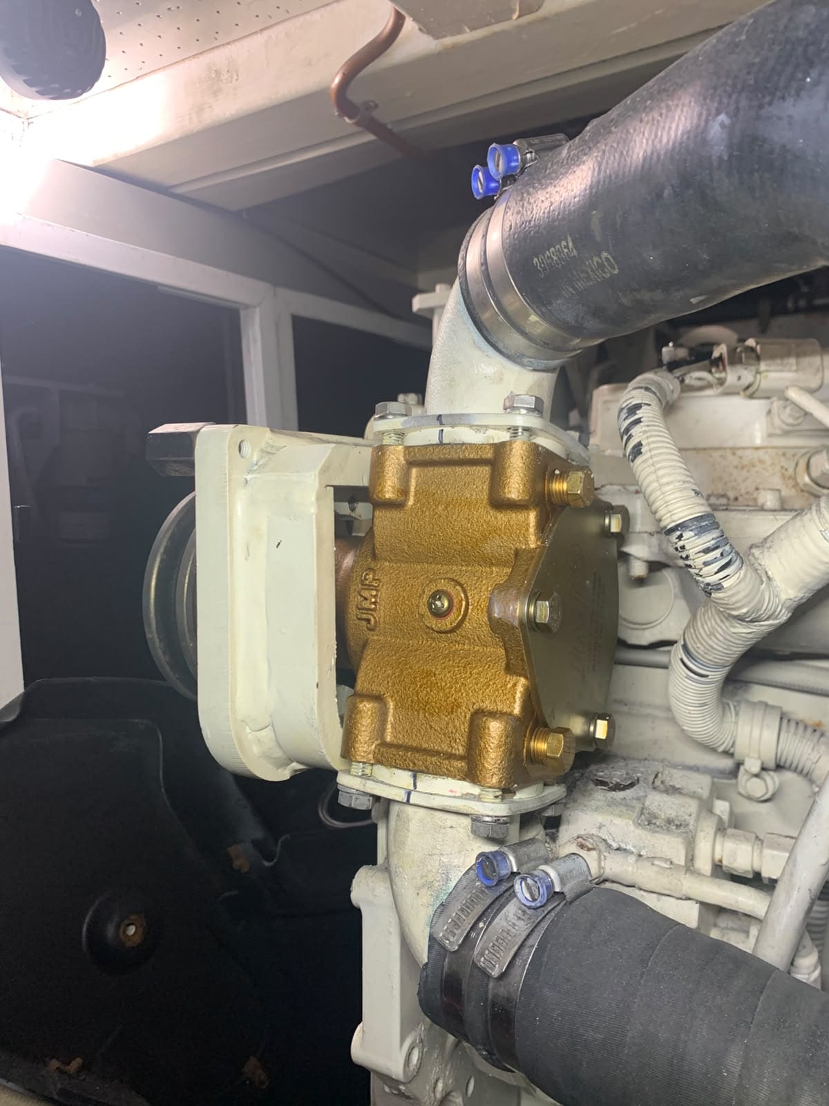 New raw water pump fitted and belted up on the engine