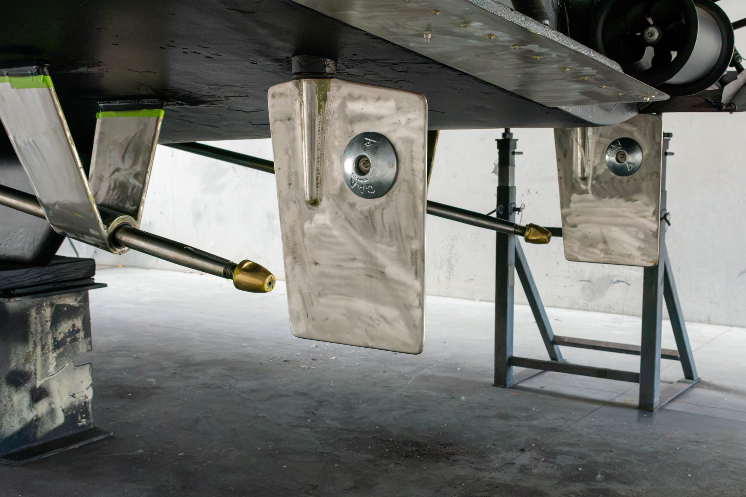 Both shafts back through the new bearings, rudders and anodes on, propellers still to come
