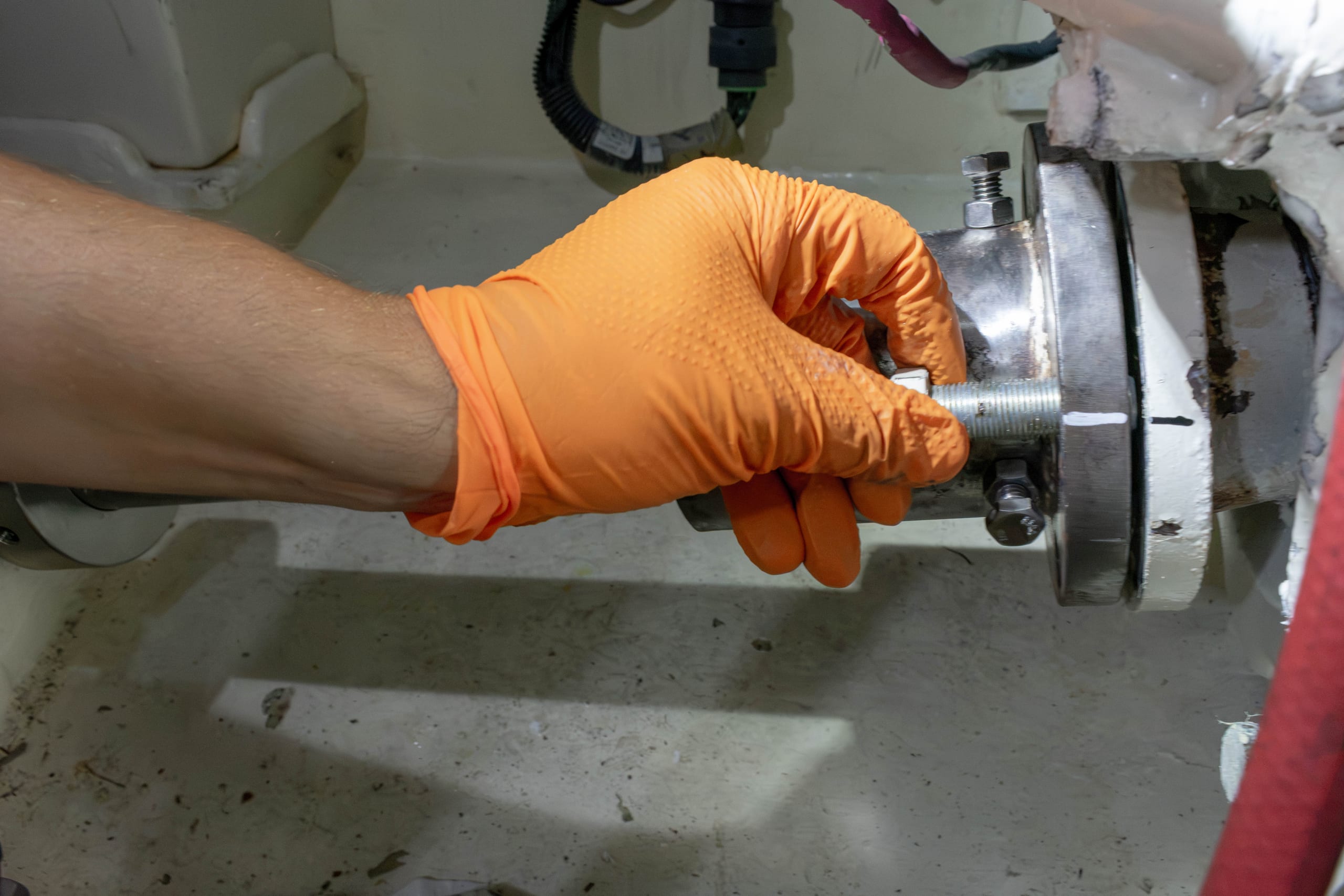 Coupling bolts going in at the gearbox flange with Loctite on the threads
