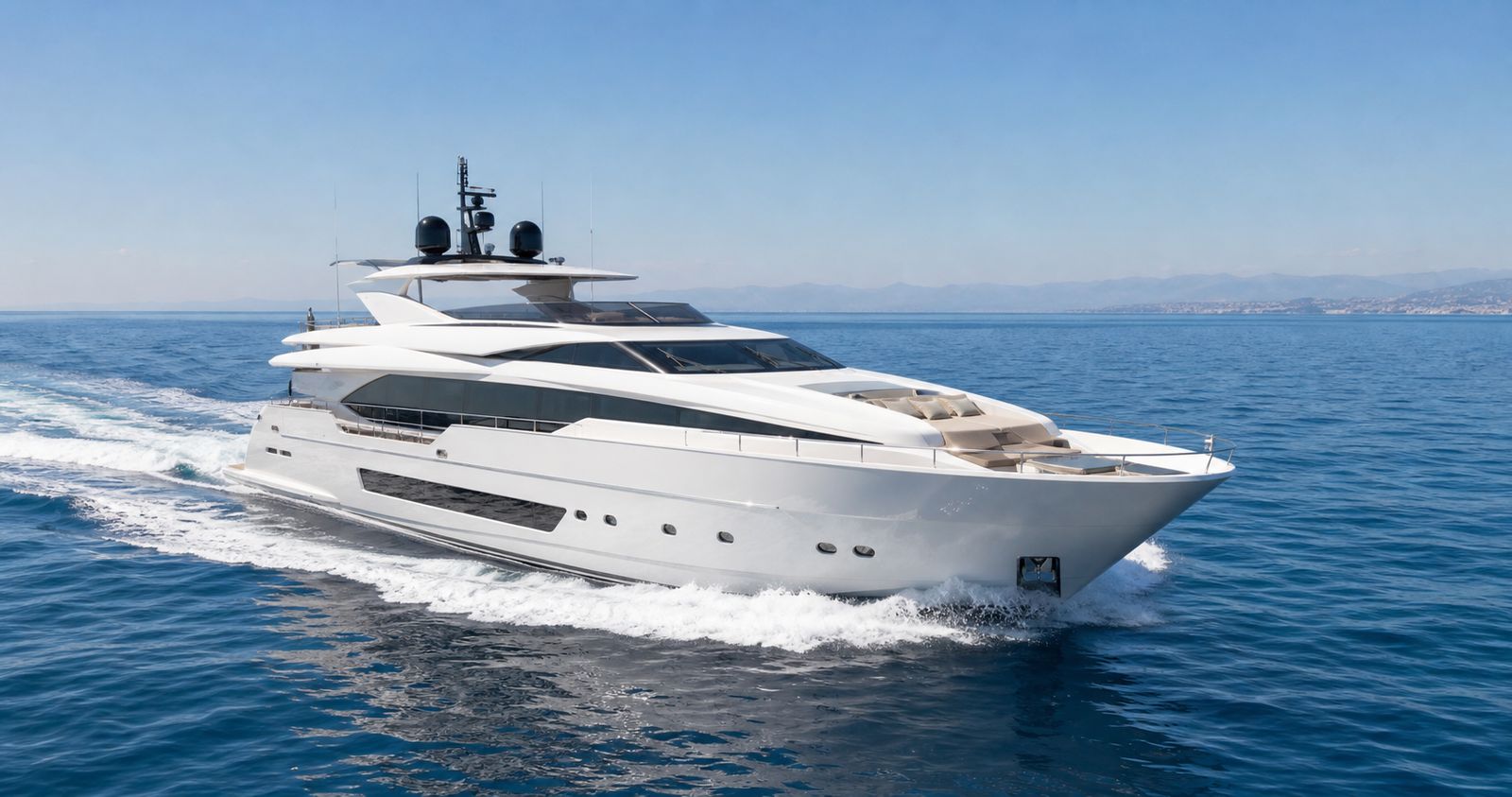 A superyacht cruising on open water