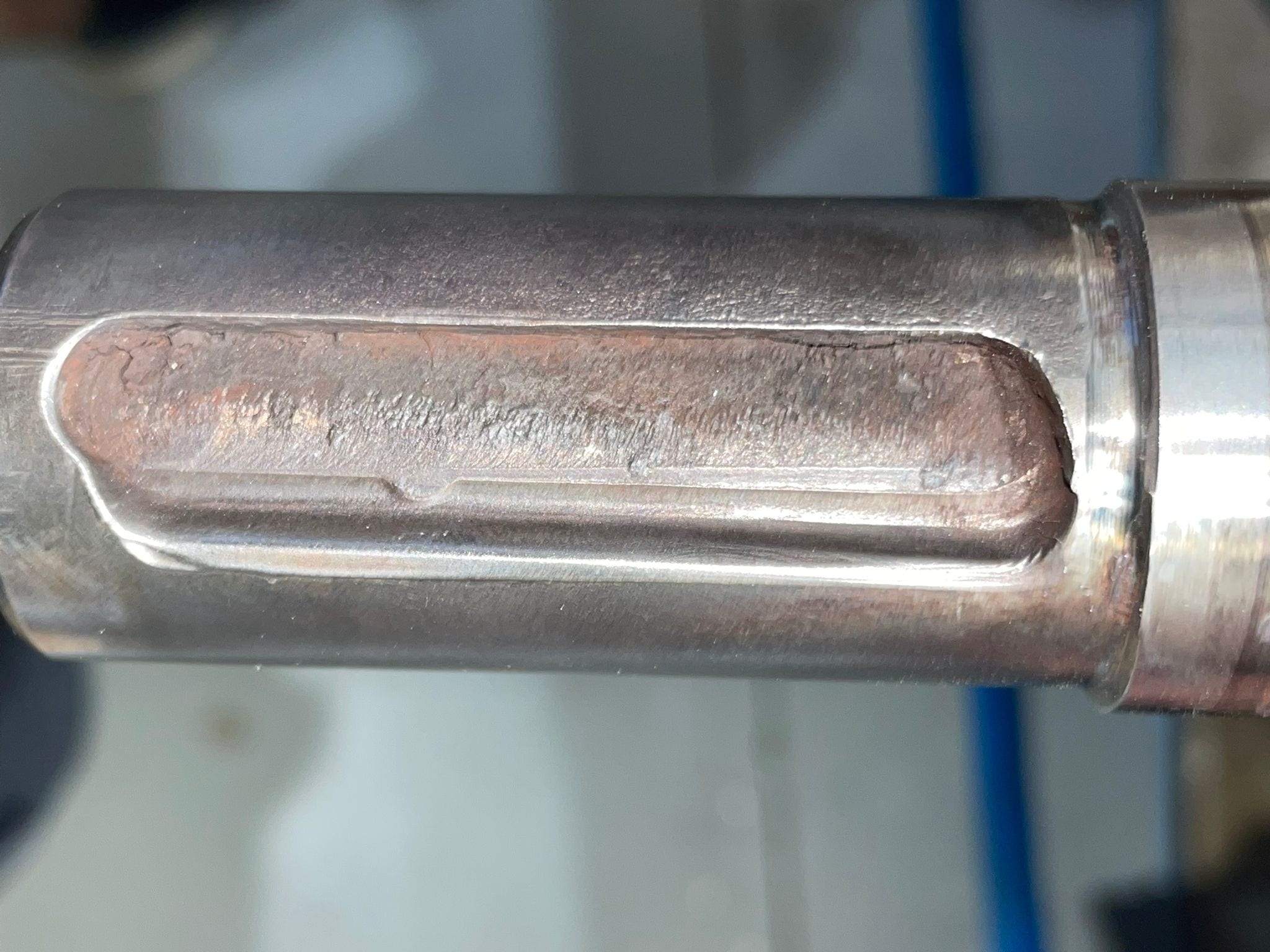 Damage around the rotor-shaft keyway that pointed to the failure
