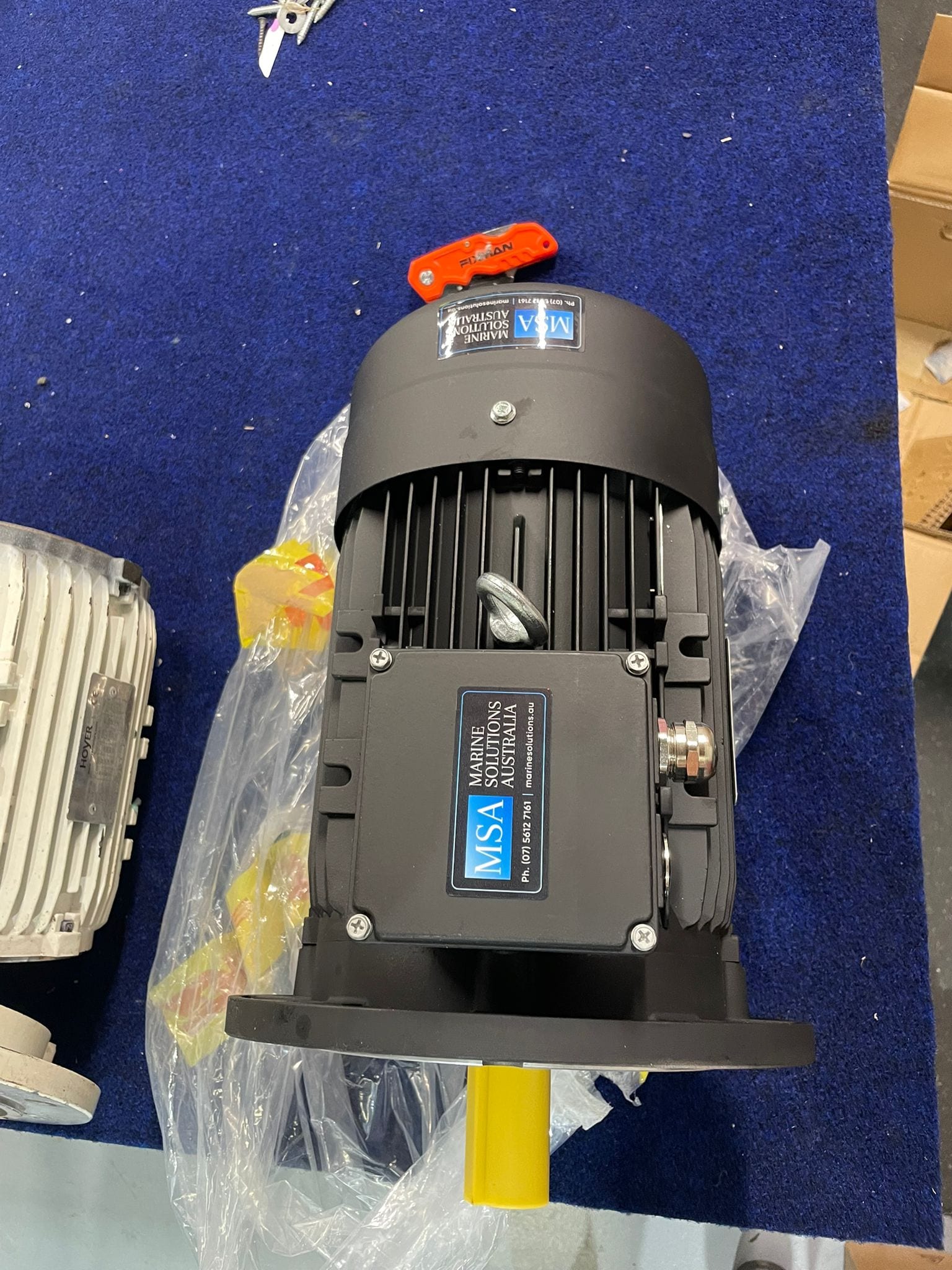 Replacement motor checked and labelled before express dispatch north