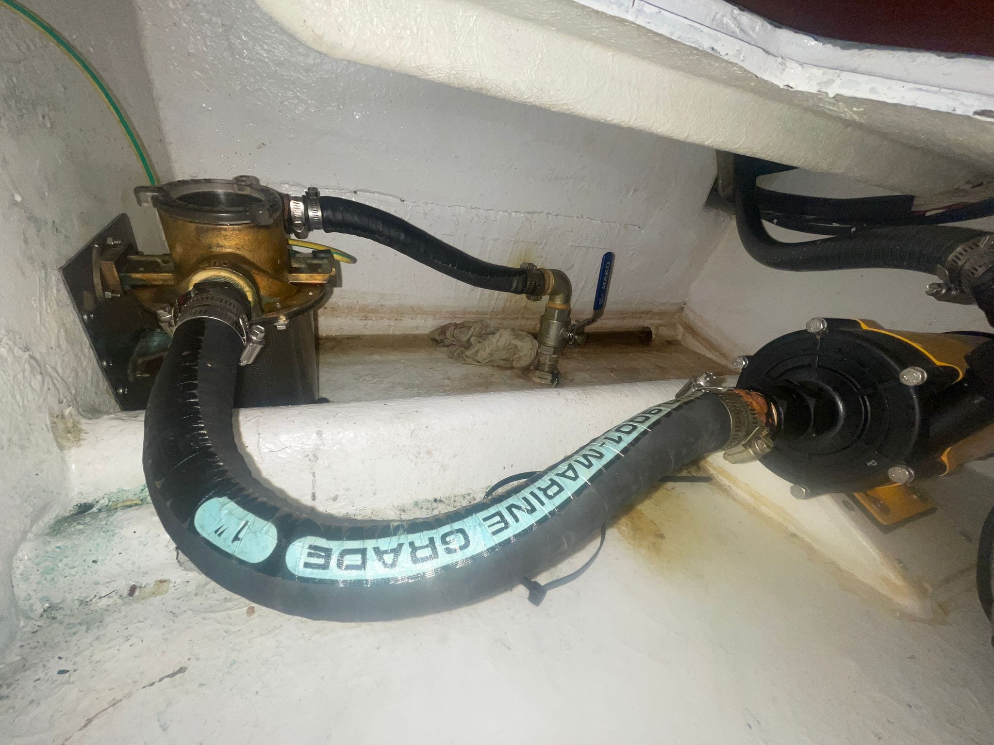 Rebuilt sea strainer back in service with a new basket and marine-grade hose