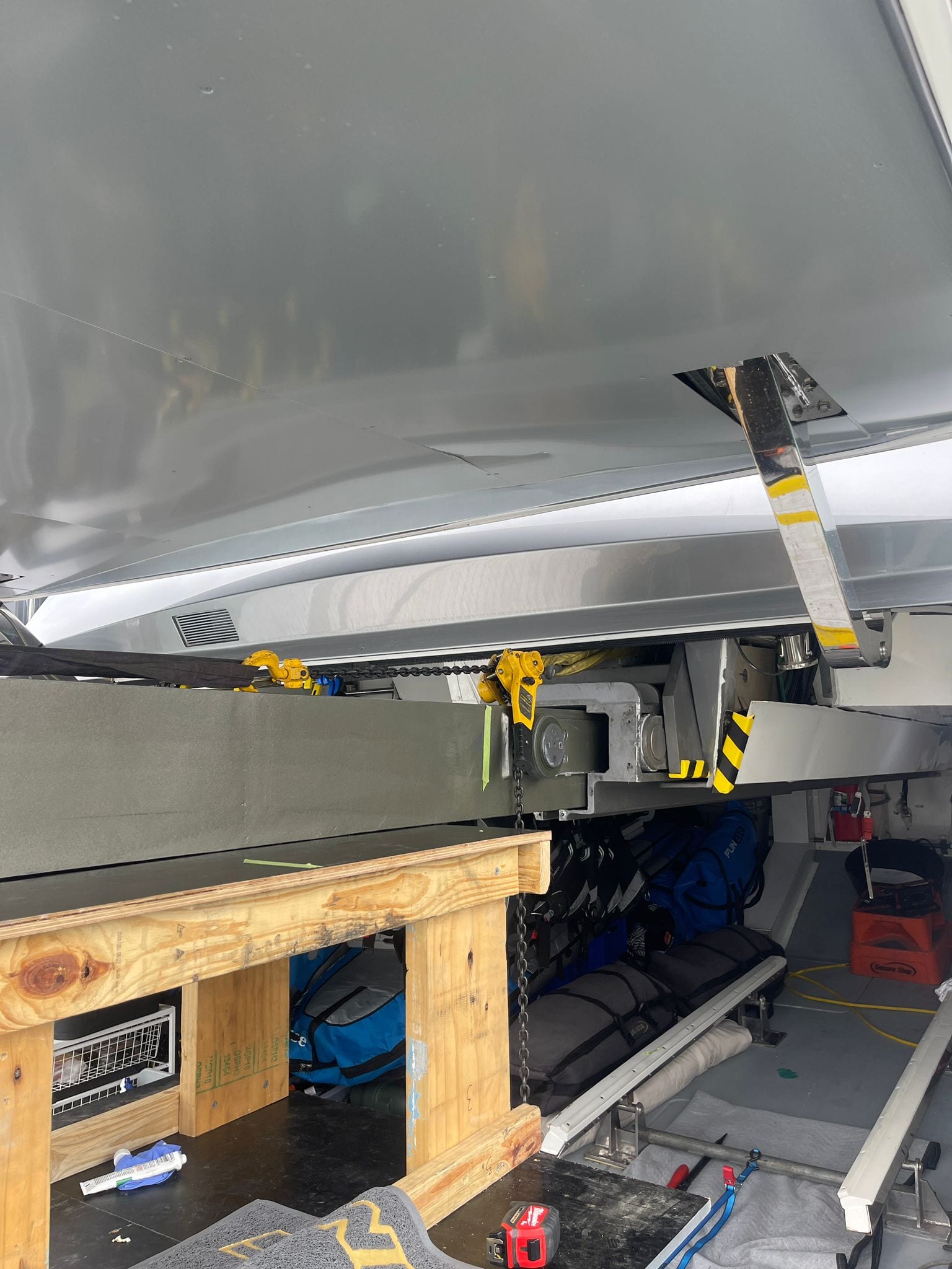 Chain lever hoists taking the beam weight inside the tender garage