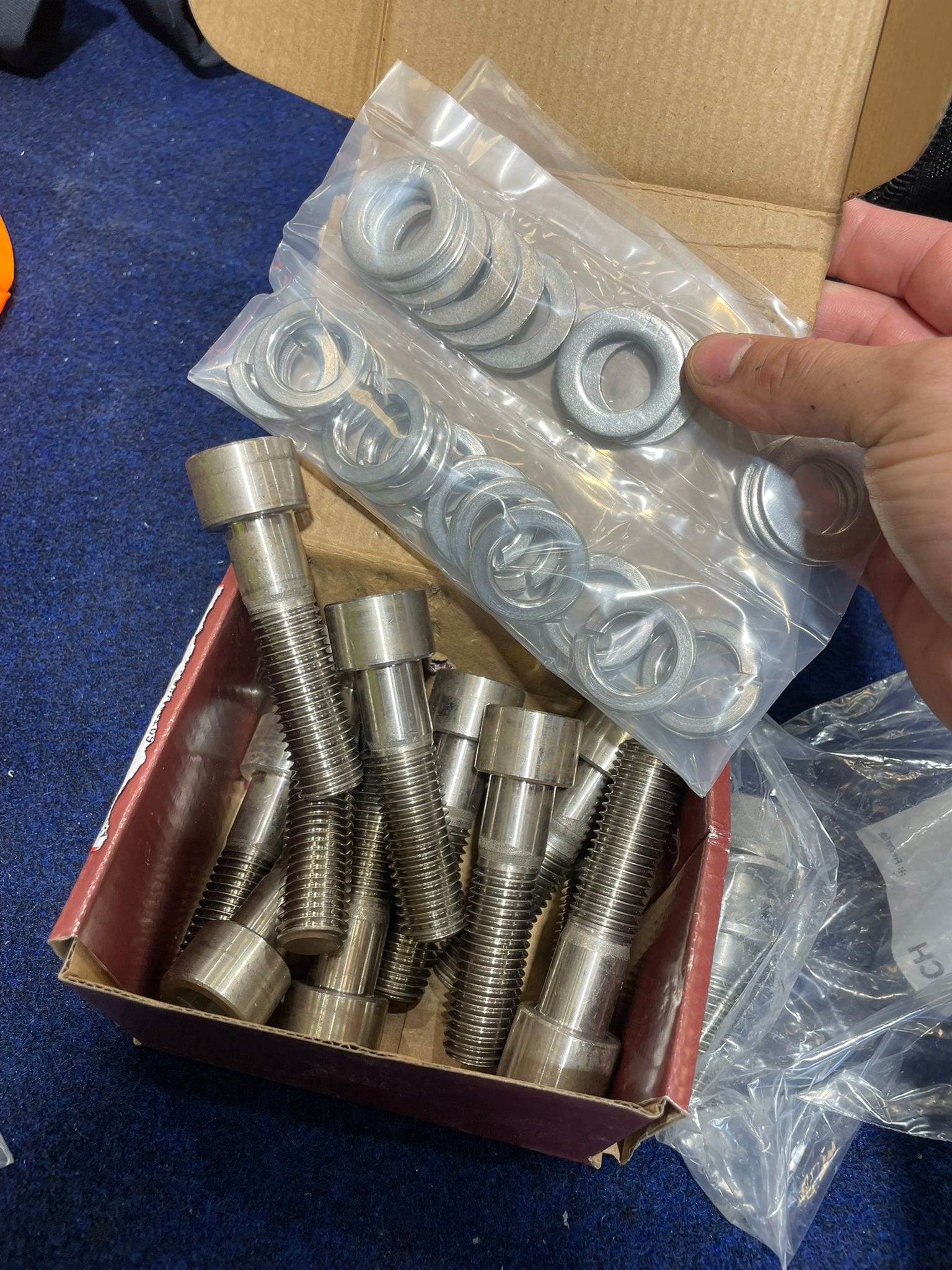 New stainless mounting bolts and washers to replace the bent originals