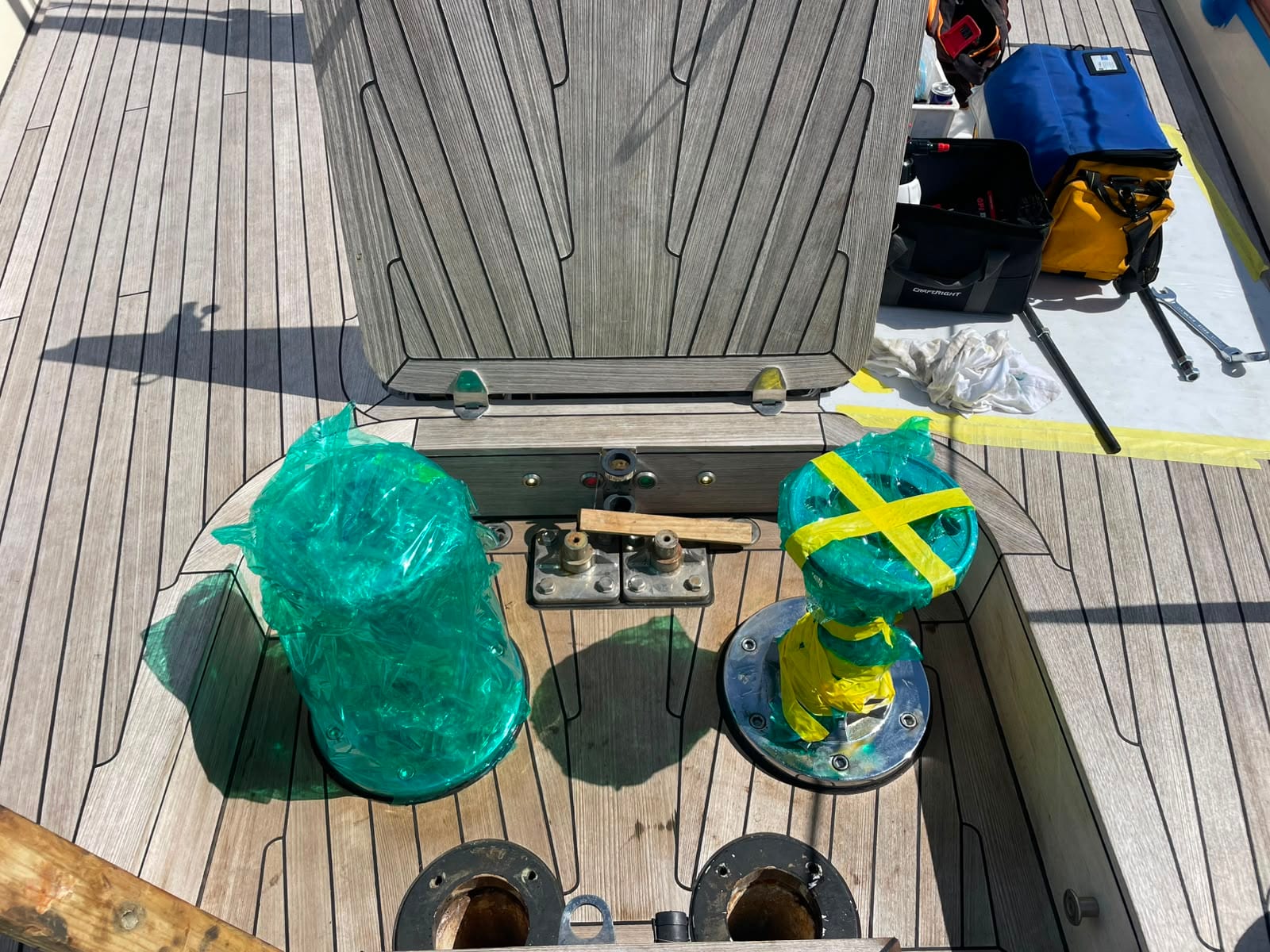 Deck plates fitted on fresh sealant, the remaining parts wrapped on deck
